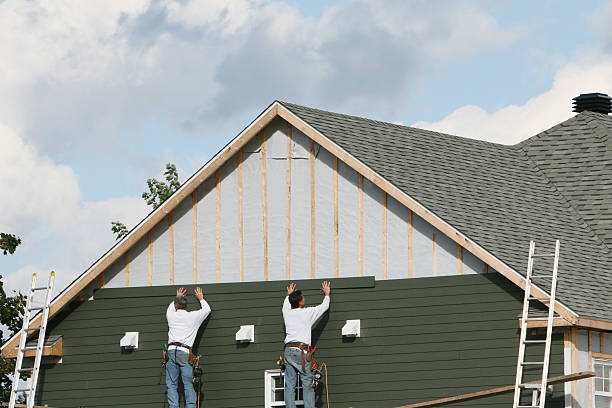 Professional Siding technician working in New Holland, OH